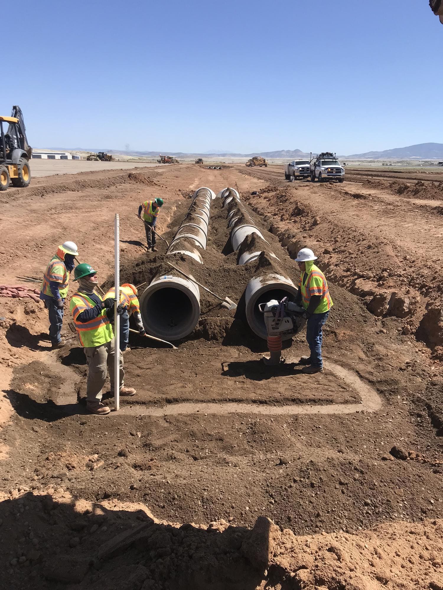 A group of workers are working on the Phase 3 construction project at Prescott Regional Airport.