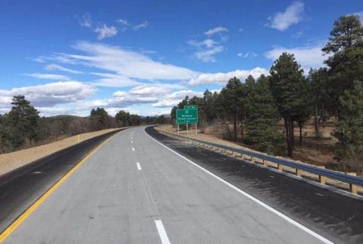 A sign in the middle of the Ash Fork – Flagstaff Highway (I-40) road.